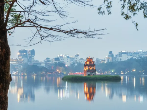 Turtle Tower illuminated at night on Hoan Kiem Lake, Hanoi