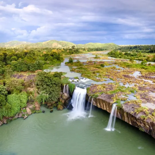 Aerial view of Dray Nur Waterfall flowing through the Central Highlands near Buon Ma Thuot
