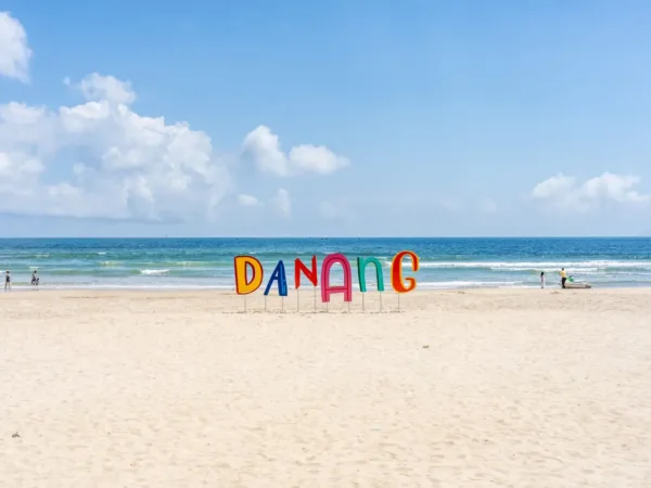 Sunny day on the beach in Da Nang with a calm sea