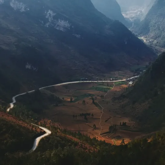 Winding mountain road through the hills of Ha Giang