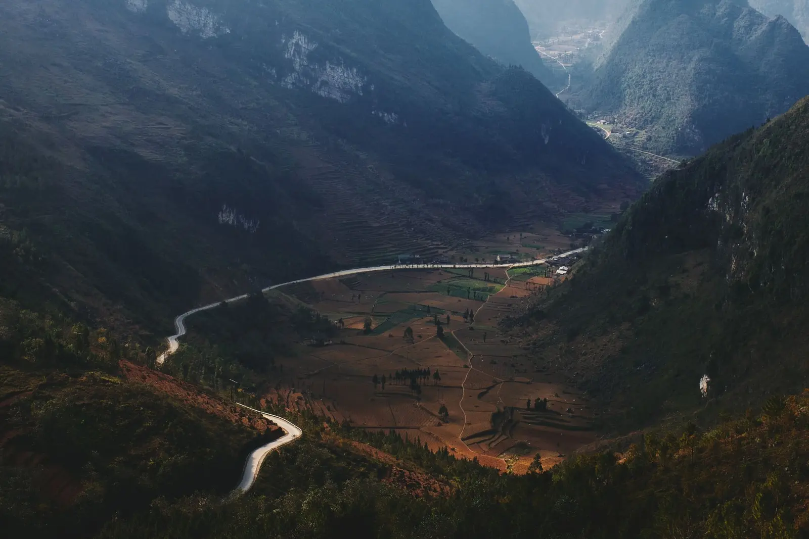 Winding mountain road through the hills of Ha Giang